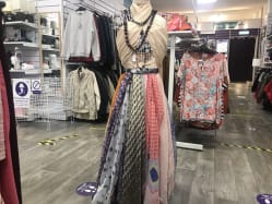 Shop with DEBRA: Display of scarfs in DEBRA Saltcoats
