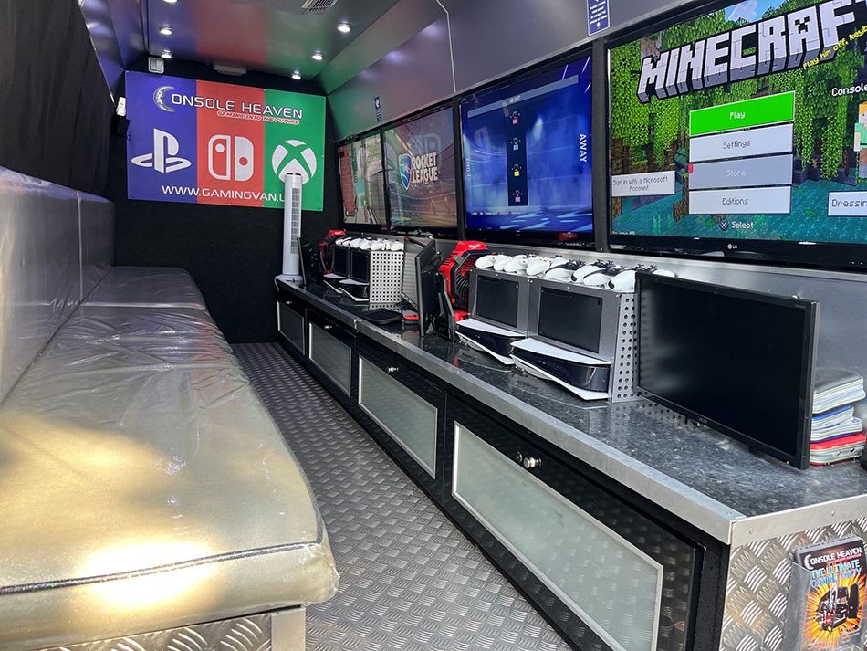 A photo showing the consoles and some of the games available in the Console Heaven gaming van that